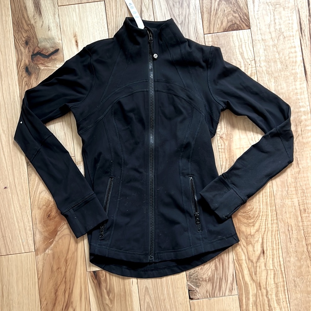 Black Lulu Lemon zip up with zipper pockets